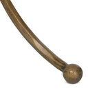 Hammered aged brass forms a tulip-shaped base with ball details for a design-forward touch. Bullnose edges on a rounded fossil marble tabletop soften the whole look Amethyst Home provides interior design, new home construction design consulting, vintage area rugs, and lighting in the Scottsdale metro area.