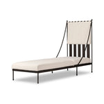 Statement-making comfort. This outdoor chaise brings a modern, French Deco-inspired look with bold color contrast to the patio. High back vertical slats pair with the removable canopy and small finial details for a unique take on traditional. Cover or store indoors during inclement weather and when not in use Amethyst Home provides interior design, new home construction design consulting, vintage area rugs, and lighting in the Austin metro area.
