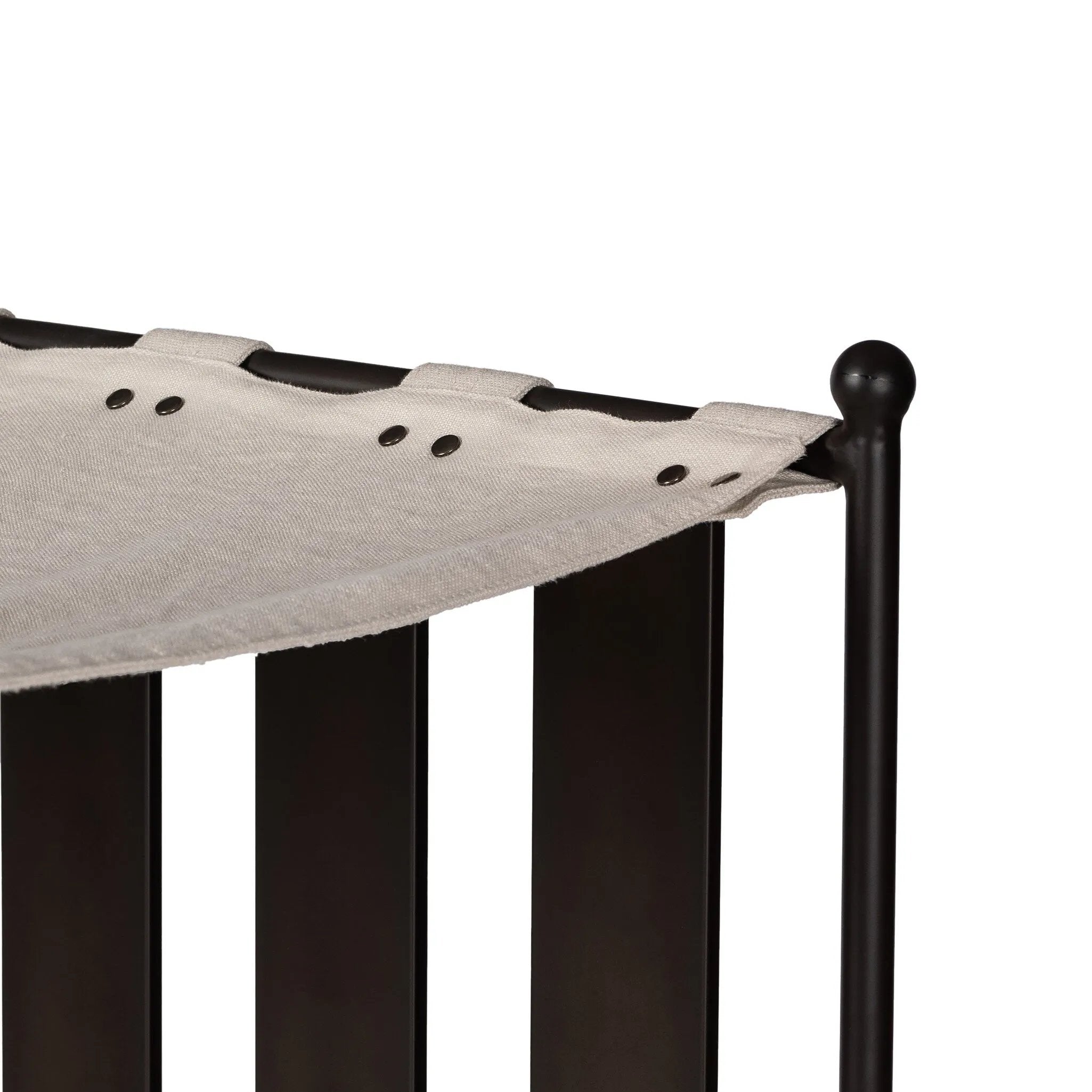 Statement-making comfort. This outdoor chaise brings a modern, French Deco-inspired look with bold color contrast to the patio. High back vertical slats pair with the removable canopy and small finial details for a unique take on traditional. Cover or store indoors during inclement weather and when not in use Amethyst Home provides interior design, new home construction design consulting, vintage area rugs, and lighting in the Houston metro area.