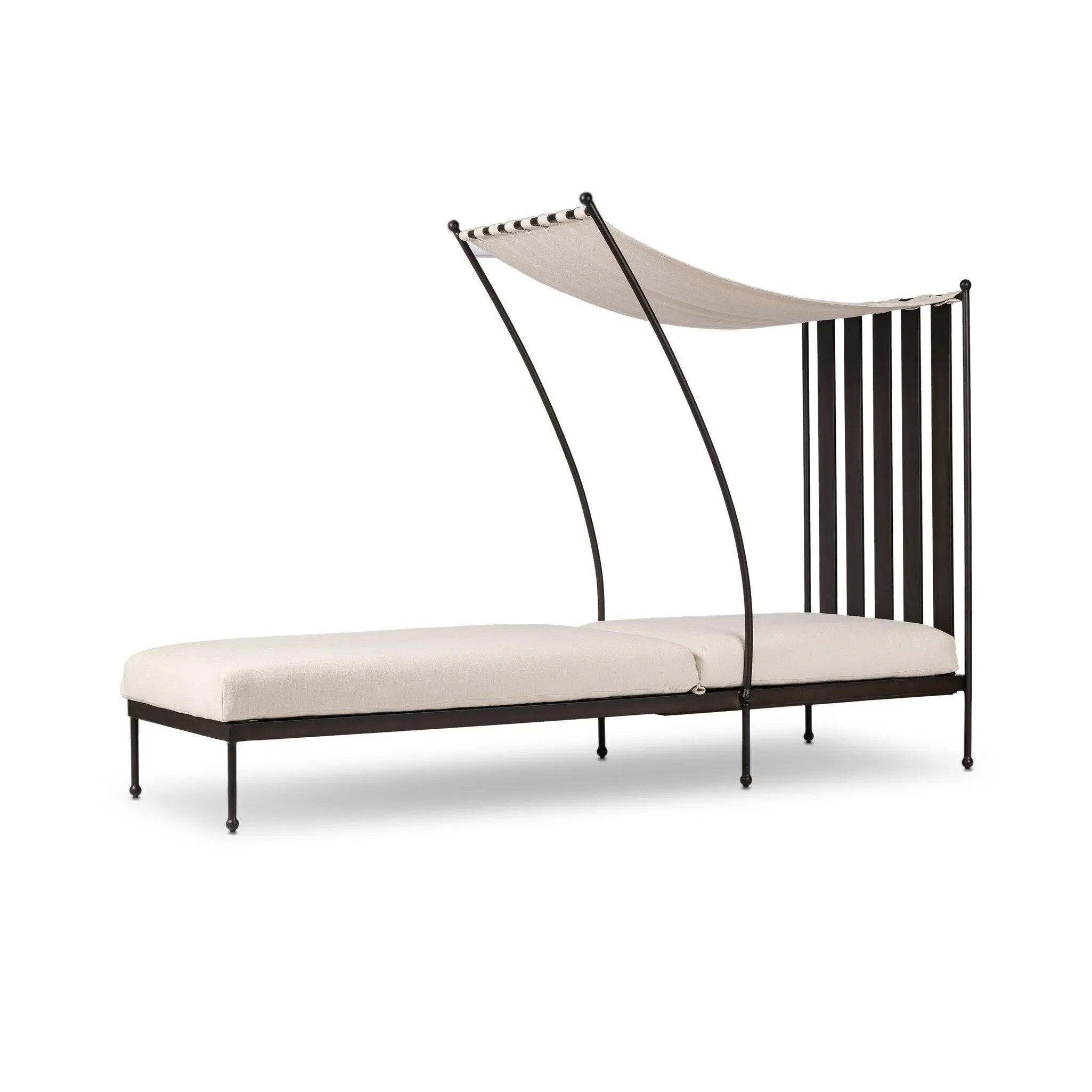 Statement-making comfort. This outdoor chaise brings a modern, French Deco-inspired look with bold color contrast to the patio. High back vertical slats pair with the removable canopy and small finial details for a unique take on traditional. Cover or store indoors during inclement weather and when not in use Amethyst Home provides interior design, new home construction design consulting, vintage area rugs, and lighting in the Newport Beach metro area.
