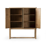 Featuring Tamara Worn Oak Cabinet by Four Hands at Amethyst Home. Worn oak cabinetry with paneled doors, all atop an elevated stand. With natural cracks for character, this piece can be styled just about anywhere, bringing with it bonus storage and vintage charm.
Overall Dimensions: 19.25" L x 60.5 " W x 69.5" H
Collection: CordellaColors: Worn Oak VeneerMate. Amethyst Home provides interior design, new home construction design consulting, vintage area rugs, and lighting in the Houston metro area.