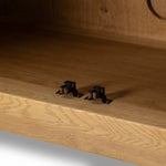 Worn oak sideboard with paneled doors, all atop an elevated stand. With natural cracks for character, this piece brings bonus storage and vintage charm to dining spaces Amethyst Home provides interior design, new home construction design consulting, vintage area rugs, and lighting in the Los Angeles metro area.