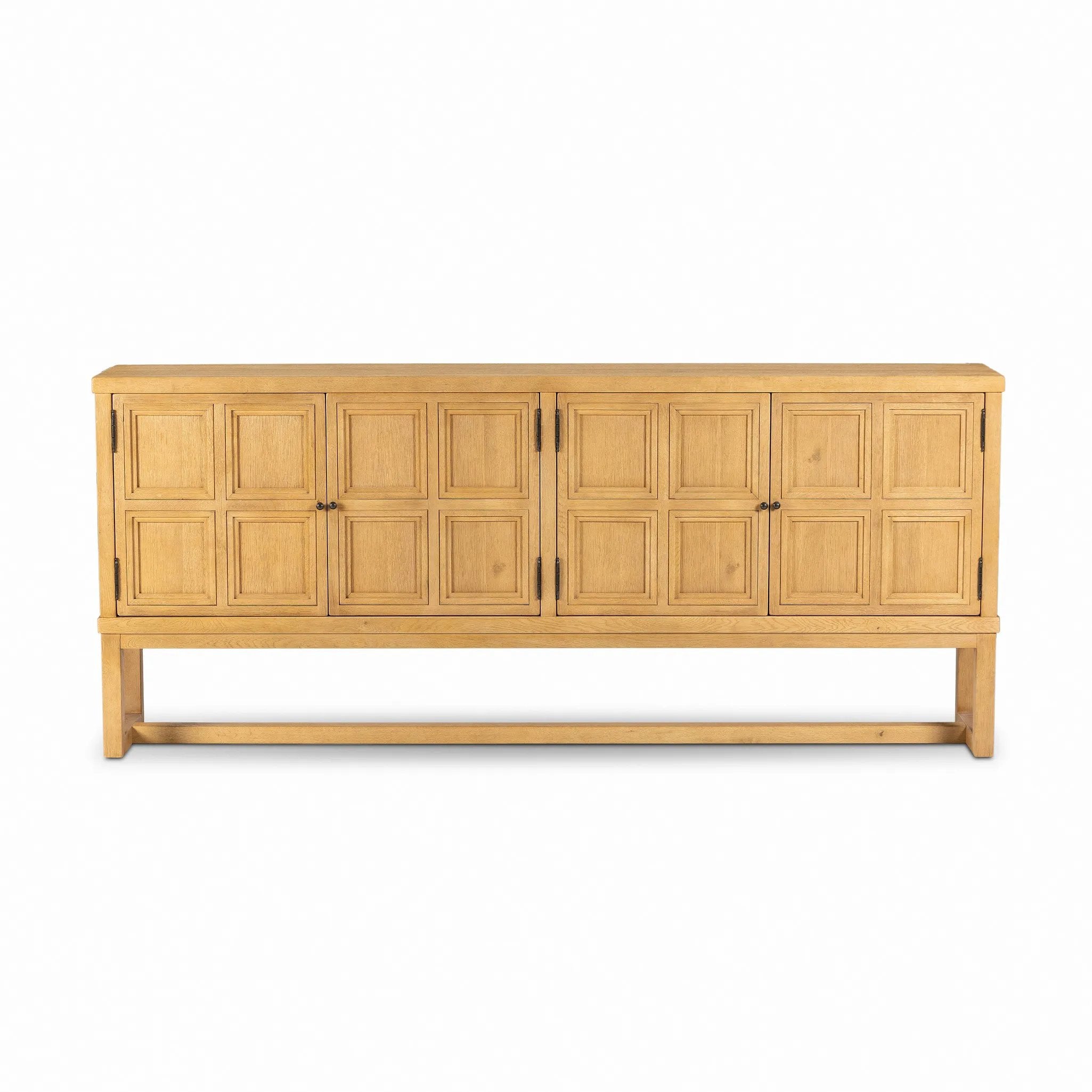 Worn oak sideboard with paneled doors, all atop an elevated stand. With natural cracks for character, this piece brings bonus storage and vintage charm to dining spaces Amethyst Home provides interior design, new home construction design consulting, vintage area rugs, and lighting in the Miami metro area.