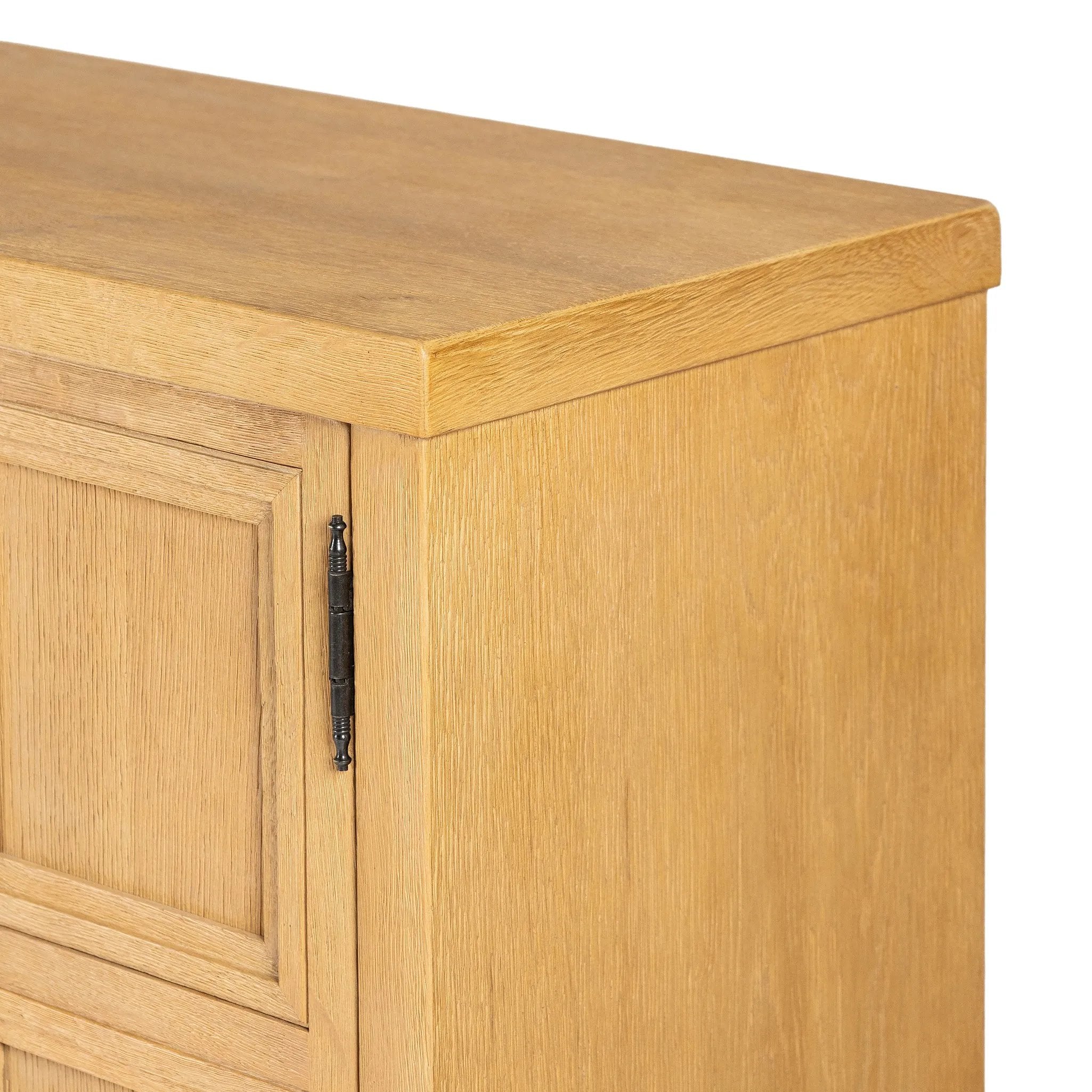 Worn oak sideboard with paneled doors, all atop an elevated stand. With natural cracks for character, this piece brings bonus storage and vintage charm to dining spaces Amethyst Home provides interior design, new home construction design consulting, vintage area rugs, and lighting in the Nashville metro area.