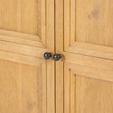 Worn oak sideboard with paneled doors, all atop an elevated stand. With natural cracks for character, this piece brings bonus storage and vintage charm to dining spaces Amethyst Home provides interior design, new home construction design consulting, vintage area rugs, and lighting in the Tampa metro area.