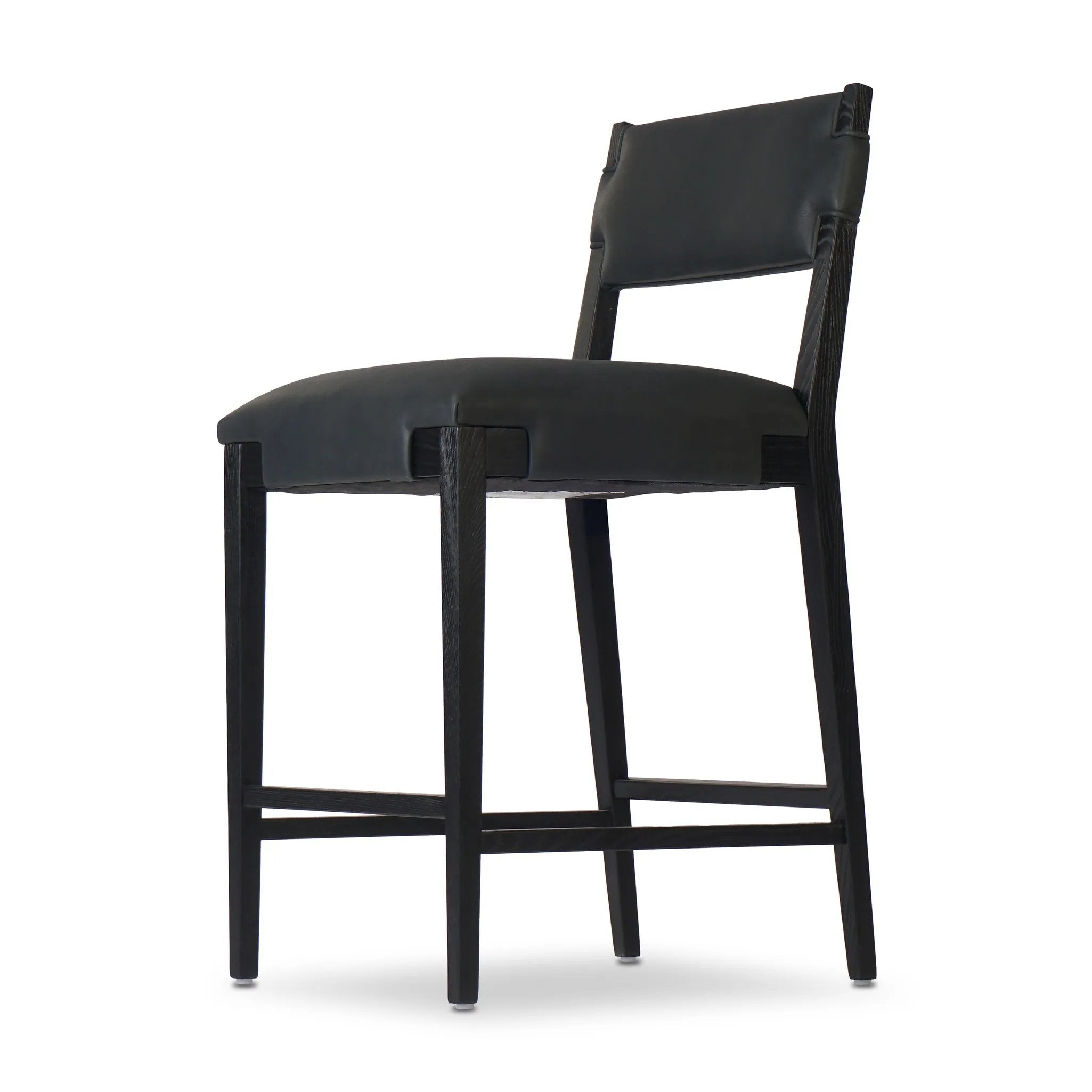 Featuring Tamari Brickhouse Black Bar + Counter Stool by Four Hands at Amethyst Home. Introducing the Tamari Brickhouse Black Bar + Counter Stool. With its sleek and modern design, this stool is the perfect addition to any luxury home. Crafted with premium materials, it offers both style and comfort. Elevate your space with this sophisticated and exclusive pie. Amethyst Home provides interior design, new home construction design consulting, vintage area rugs, and lighting in the Austin metro area.