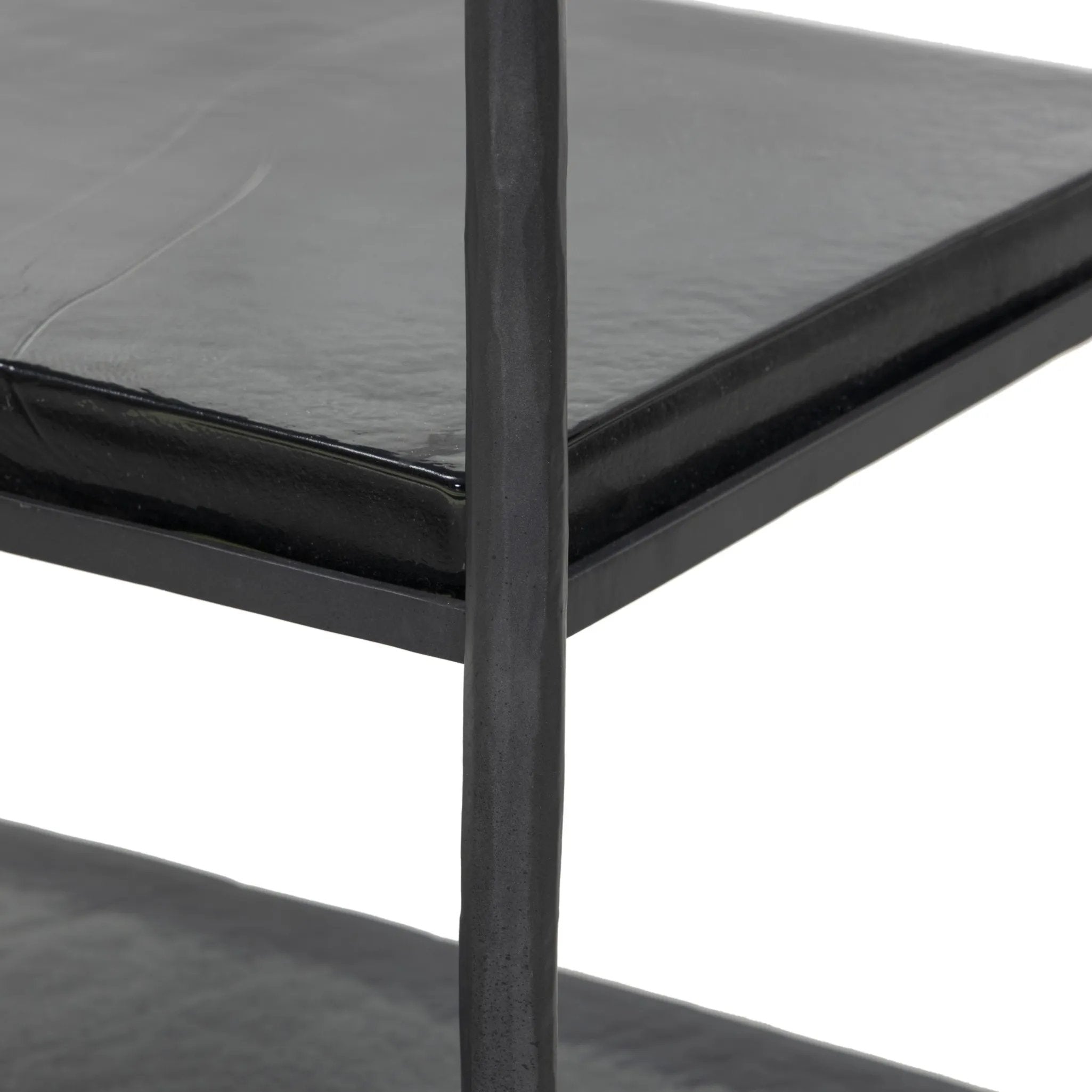 Elevate cocktail hour with an always-in-style rolling bar cart. Crafted from black hammered metal with three tiers of smoked cast glass, offering smooth surface space for storage and display Amethyst Home provides interior design, new home construction design consulting, vintage area rugs, and lighting in the Alpharetta metro area.