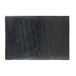 Elevate cocktail hour with an always-in-style rolling bar cart. Crafted from black hammered metal with three tiers of smoked cast glass, offering smooth surface space for storage and display Amethyst Home provides interior design, new home construction design consulting, vintage area rugs, and lighting in the Salt Lake City metro area.