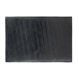 Elevate cocktail hour with an always-in-style rolling bar cart. Crafted from black hammered metal with three tiers of smoked cast glass, offering smooth surface space for storage and display Amethyst Home provides interior design, new home construction design consulting, vintage area rugs, and lighting in the Salt Lake City metro area.