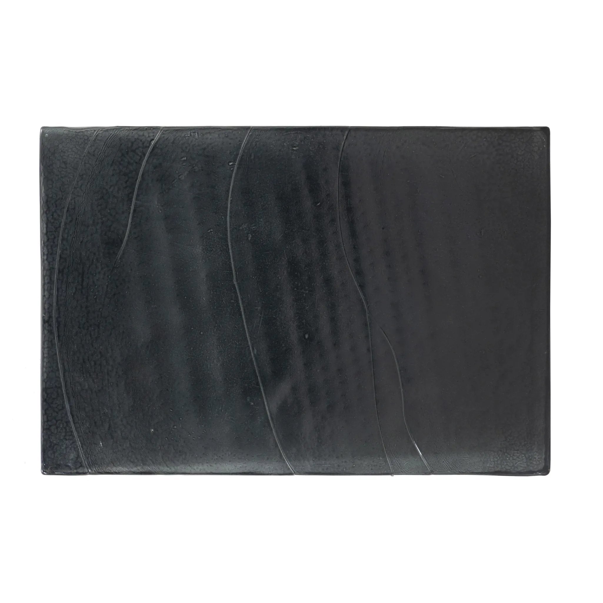 Elevate cocktail hour with an always-in-style rolling bar cart. Crafted from black hammered metal with three tiers of smoked cast glass, offering smooth surface space for storage and display Amethyst Home provides interior design, new home construction design consulting, vintage area rugs, and lighting in the Salt Lake City metro area.