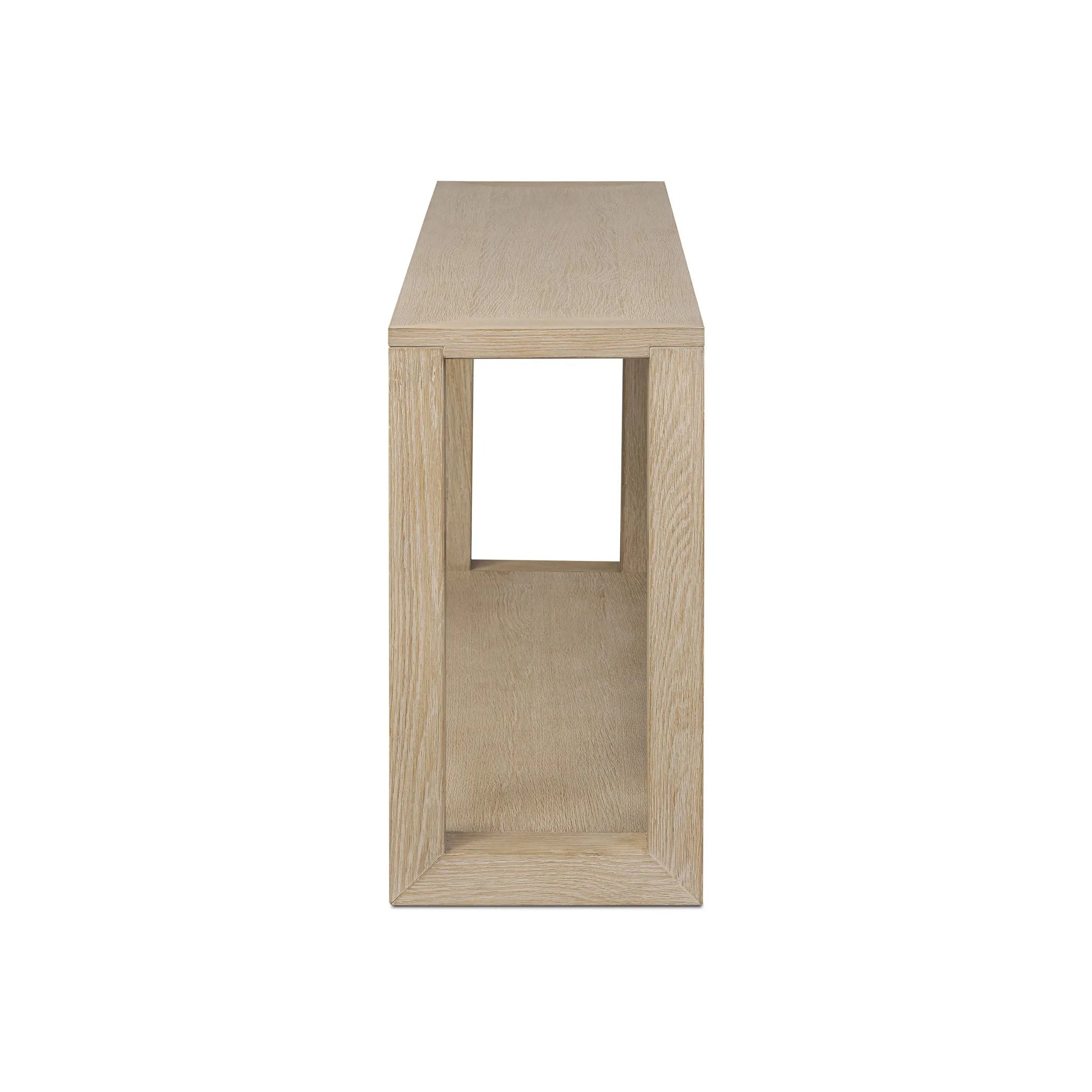 Made from bleached solid oak, a long, open-style console table brings a light, clean look to your living or media room. Lower shelving brings bonus storage and display of media, favorite books and more Amethyst Home provides interior design, new home construction design consulting, vintage area rugs, and lighting in the Miami metro area.