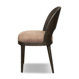 A rounded frame, bent leg profile reflect the midcentury inspiration behind this mixed material dining chair. Framed by parawood with solid oak legs finished in a classic black.As enthusiasts of modern style at Amethyst, we love the warm modern inspired Thorton Dining Chair - Laughlin Cafe. Amethyst Home provides interior design, new home construction design consulting, vintage area rugs, and lighting in the Tampa metro area.