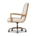 A classic silhouette is modernized with a cotton- and linen-blend performance fabric, then elevated with a top-grain leather back Amethyst Home provides interior design, new home construction design consulting, vintage area rugs, and lighting in the Seattle metro area.