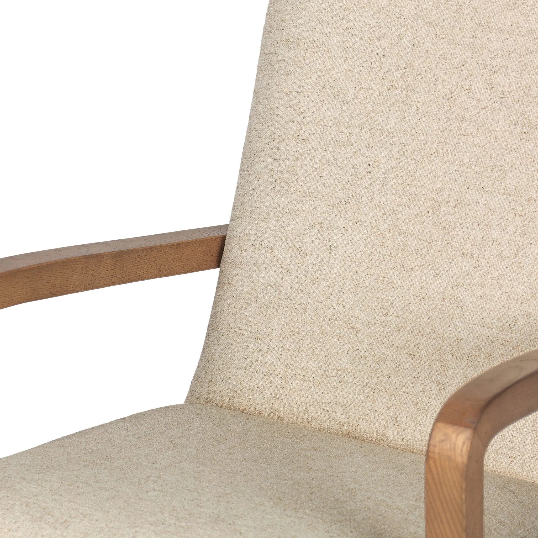 A classic silhouette is modernized with a cotton- and linen-blend performance fabric, then elevated with a top-grain leather back Amethyst Home provides interior design, new home construction design consulting, vintage area rugs, and lighting in the Tampa metro area.