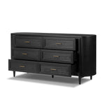 Infuse your collection with timeless midcentury design. Crafted from oak and parawood, a six-drawer dresser is finished in a matte black, with simple brass hardware Amethyst Home provides interior design, new home construction design consulting, vintage area rugs, and lighting in the Charlotte metro area.
