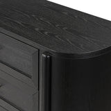 Infuse your collection with timeless midcentury design. Crafted from oak and parawood, a six-drawer dresser is finished in a matte black, with simple brass hardware Amethyst Home provides interior design, new home construction design consulting, vintage area rugs, and lighting in the Newport Beach metro area.