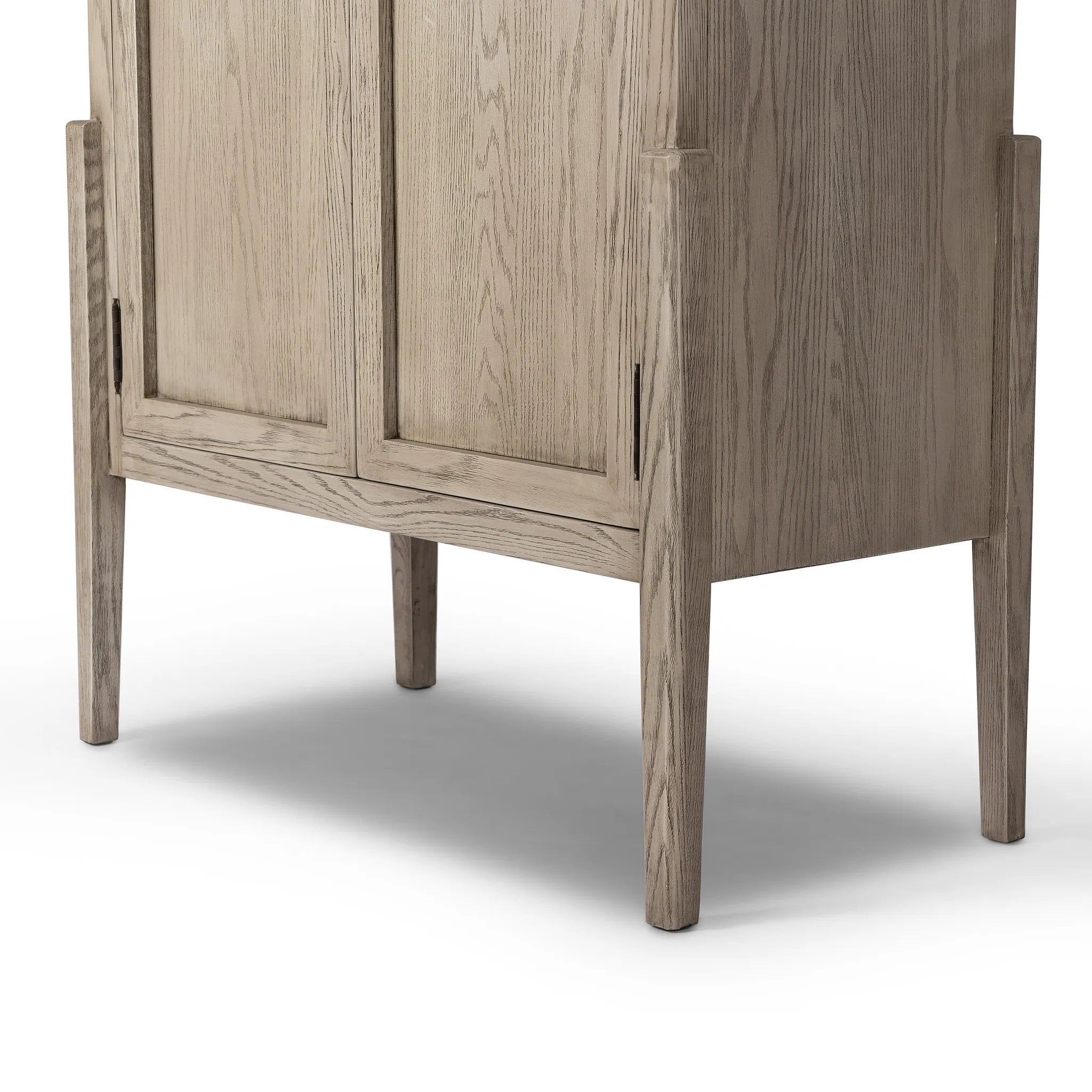 Featuring Tolle Rustic White Solid Panel Door Cabinet by Four Hands at Amethyst Home. Store it in style. Beautifully shaped cabinetry of rustic white solid oak features spacious interior shelving and recessed wood panel doors, ready for storing your treasures.Overall Dimensions: 38.00"w x 19.00"d x 84.00"hWeight : 169.75 lbsMaterials: Solid Oak, Oak Ven. Amethyst Home provides interior design, new home construction design consulting, vintage area rugs, and lighting in the Newport Beach metro area.