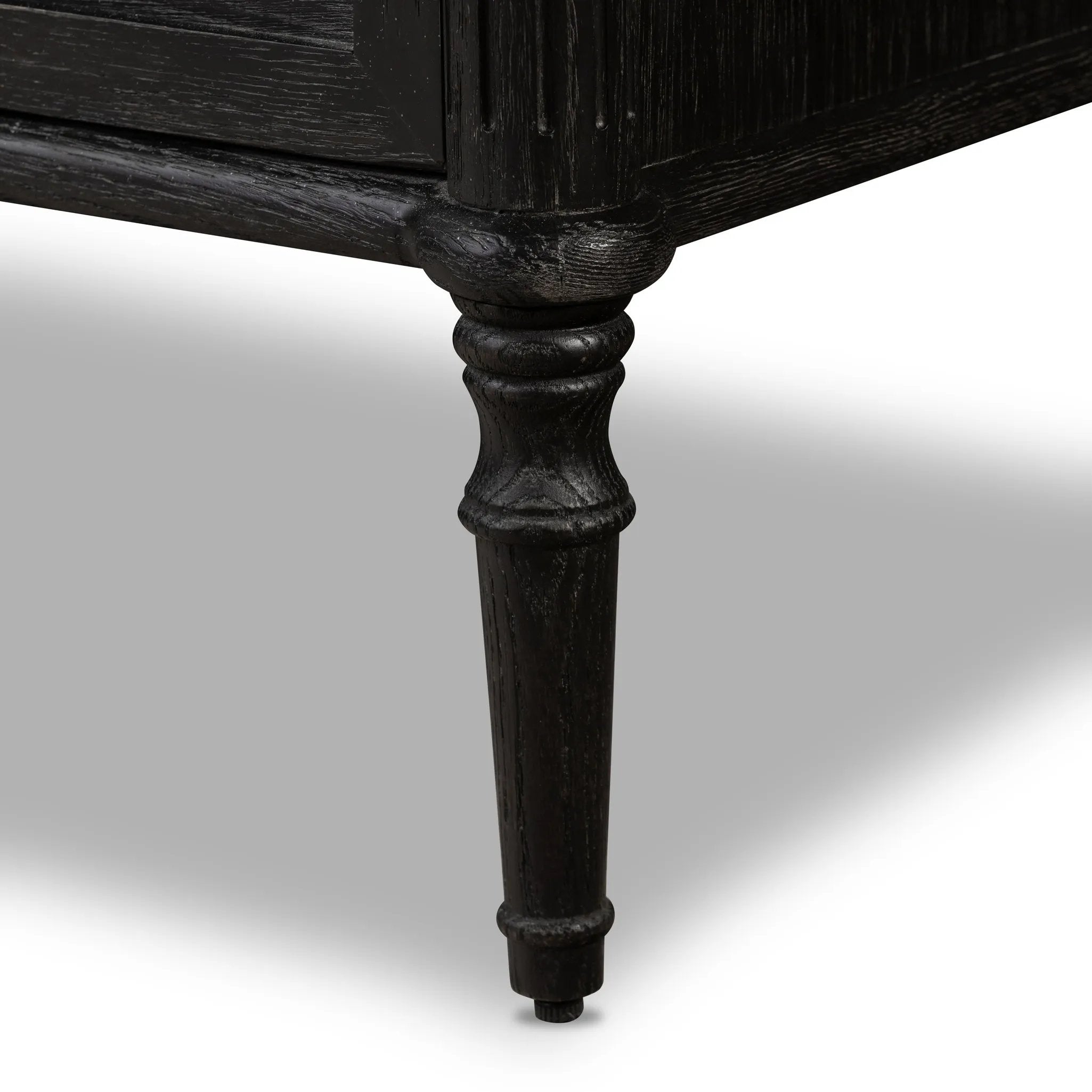 Made from distressed black-finished oak with slim legs, nine drawers bring antique European vibes to modern bedroom styling. This item has been modified to comply with the STURDY Act. See a full list of modified products and data changes in the “STURDY Act” file in the Downloads section below Amethyst Home provides interior design, new home construction design consulting, vintage area rugs, and lighting in the Newport Beach metro area.