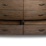 Mixed materials define this Art Deco-inspired dresser. Vein-rich marble in a warm cofffee color tops a sungkai case for a timeless yet modern look.As lovers of modern aesthetics at Amethyst, we love the warm modern inspired Tovae Dresser - Stained Saddle Brown Sungkai. Amethyst Home provides interior design, new home construction design consulting, vintage area rugs, and lighting in the Winter Garden metro area.
