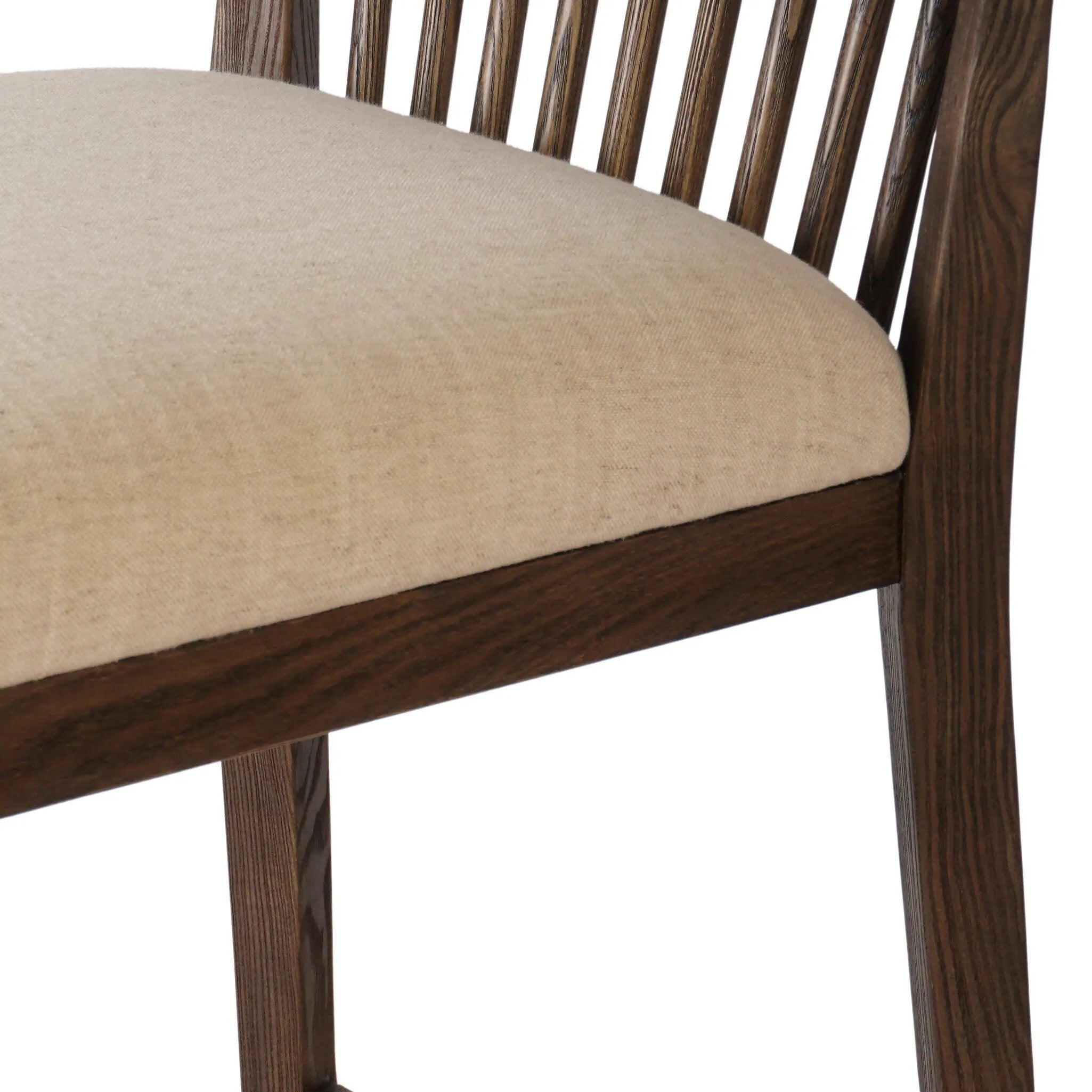 A low, linear counter stool inspired by Japanese tea houses, crafted from natural ash. Designed for comfort, a thick cushion seat is upholstered in a casual poly-linen blend Amethyst Home provides interior design, new home construction design consulting, vintage area rugs, and lighting in the Portland metro area.