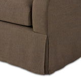 Meet the piece that can do it all. Coffee-colored fabric covers a long bench-style seat, while a concealed sleeper mechanism allows for easy pullout to transform this flexible piece into an extra bed. Curved slope arms finish into a fixed slipcover with kick-pleats at the front. Amethyst Home provides interior design, new home construction design consulting, vintage area rugs, and lighting in the Park City metro area.