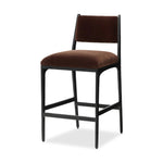 A metal frame with a tapered profile pairs with a velvety brown upholstered seat and back, striking balance in both scale in texture. Perfectly scaled for the counter.As lovers of wabi sabi design at Amethyst, we love the warm modern inspired Valeene Bar + Counter Stool. Amethyst Home provides interior design, new home construction design consulting, vintage area rugs, and lighting in the Kansas City metro area.