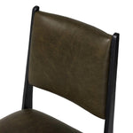 A metal frame with a tapered profile pairs with a moss-colored top-grain leather seat and back, striking balance in both scale in texture.As fans of wabi sabi aesthetics at Amethyst, we love the optimistic inspired Valeene Dining Chair - Dulane Moss. This item pairs well with other brands such as Surya and is perfect for minimalist homes Amethyst Home provides interior design, new home construction design consulting, vintage area rugs, and lighting in the Salt Lake City metro area.