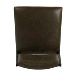 A metal frame with a tapered profile pairs with a moss-colored top-grain leather seat and back, striking balance in both scale in texture.As fans of wabi sabi aesthetics at Amethyst, we love the optimistic inspired Valeene Dining Chair - Dulane Moss. This item pairs well with other brands such as Surya and is perfect for minimalist homes Amethyst Home provides interior design, new home construction design consulting, vintage area rugs, and lighting in the Seattle metro area.
