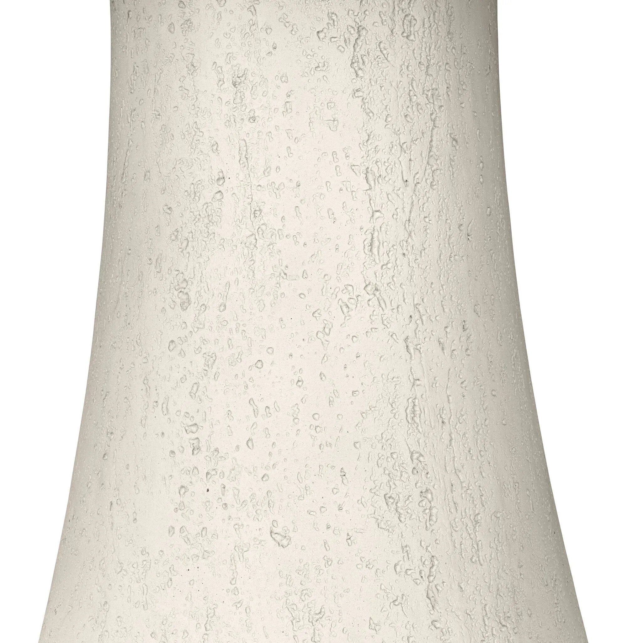 Textured ivory concrete finishes this pedestal-style outdoor dining table, with a subtly sculpted, tulip-shaped base bringing visual depth to any space. Cover or store indoors when not in use or during inclement weather.As fans of natural design at Amethyst, we love the designer inspired Varda Outdoor Dining Table 48". Amethyst Home provides interior design, new home construction design consulting, vintage area rugs, and lighting in the Charlotte metro area.