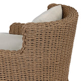 This outdoor chair's sculpted shape mimics classic wingback armchairs, with a double-twist woven material framing heavily textured boucle fabric for added visual weight. Cover or store inside during inclement weather or when not in use. Amethyst Home provides interior design, new home construction design consulting, vintage area rugs, and lighting in the Monterey metro area.