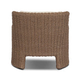 This outdoor chair's sculpted shape mimics classic wingback armchairs, with a double-twist woven material framing heavily textured boucle fabric for added visual weight. Cover or store inside during inclement weather or when not in use. Amethyst Home provides interior design, new home construction design consulting, vintage area rugs, and lighting in the San Diego metro area.