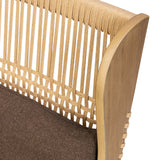 A timeless silhouette reimagined in a new way. Wrapped in high performance fabric, this wingback chair offers a rich, coffee-brown depth highlighted by delicate, linen flecks with natural highs and lows. Woven back and aged oak add beautiful character.As fans of organic modern design at Amethyst, we love the warm modern inspired Vestavia Chair. Amethyst Home provides interior design, new home construction design consulting, vintage area rugs, and lighting in the Dallas metro area.