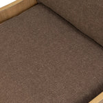 A timeless silhouette reimagined in a new way. Wrapped in high performance fabric, this wingback chair offers a rich, coffee-brown depth highlighted by delicate, linen flecks with natural highs and lows. Woven back and aged oak add beautiful character.As fans of organic modern design at Amethyst, we love the warm modern inspired Vestavia Chair. Amethyst Home provides interior design, new home construction design consulting, vintage area rugs, and lighting in the Kansas City metro area.