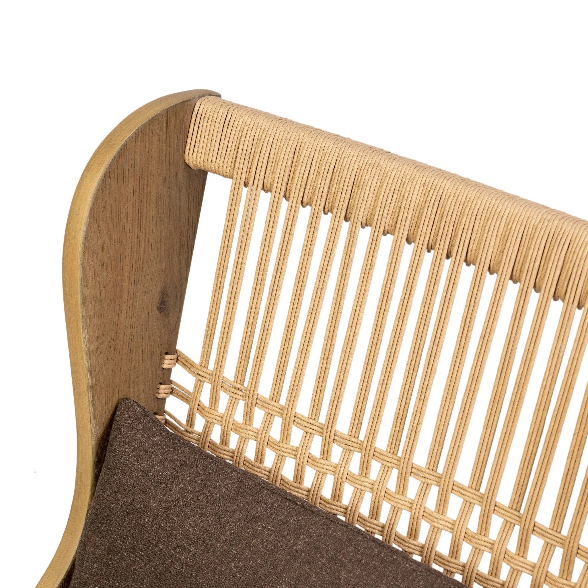 A timeless silhouette reimagined in a new way. Wrapped in high performance fabric, this wingback chair offers a rich, coffee-brown depth highlighted by delicate, linen flecks with natural highs and lows. Woven back and aged oak add beautiful character.As fans of organic modern design at Amethyst, we love the warm modern inspired Vestavia Chair. Amethyst Home provides interior design, new home construction design consulting, vintage area rugs, and lighting in the Miami metro area.