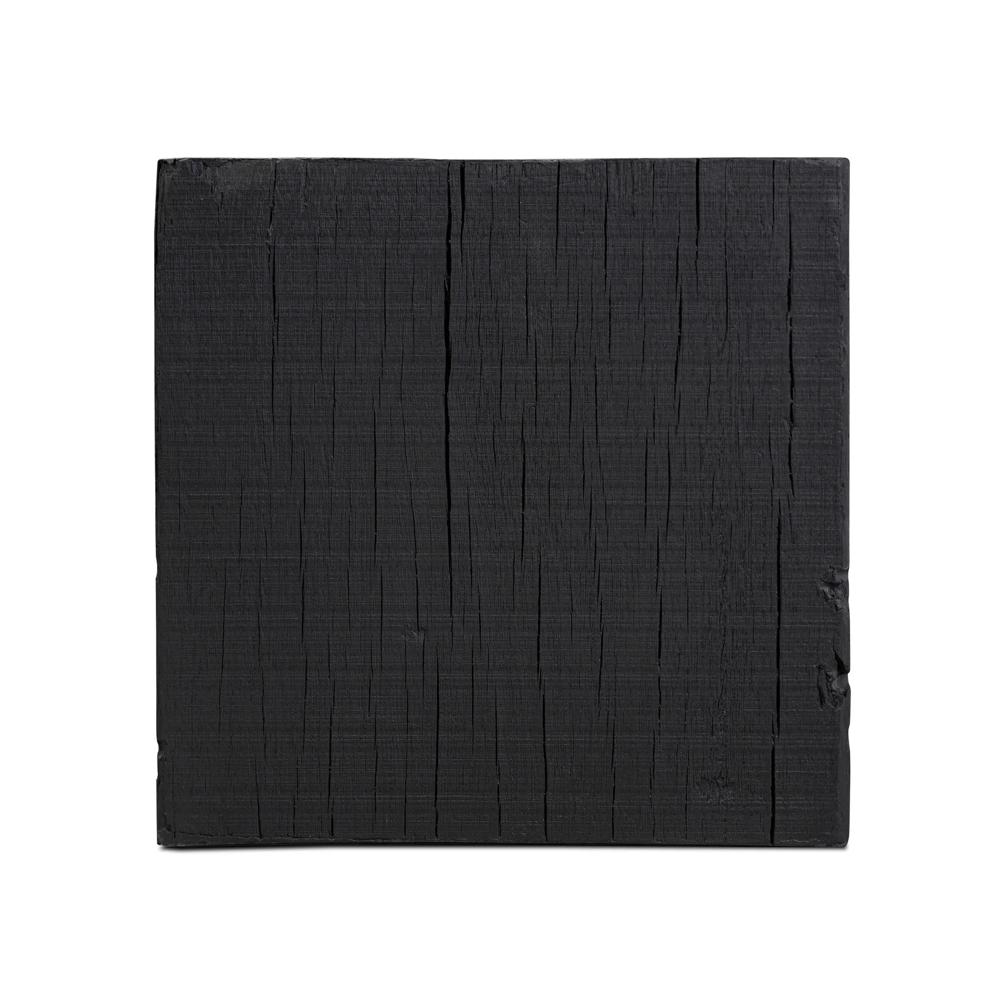 Ground any room with a style inspired by the beautiful simplicity of nature. Made of black-finished resin, the form for this special piece is molded from a tree trunk that's been cut into a square, then cast in resin to recreate the same  texture of the trunk, even the saw marks where it was cut — talk about a true statement piece Amethyst Home provides interior design, new home construction design consulting, vintage area rugs, and lighting in the Calabasas metro area.