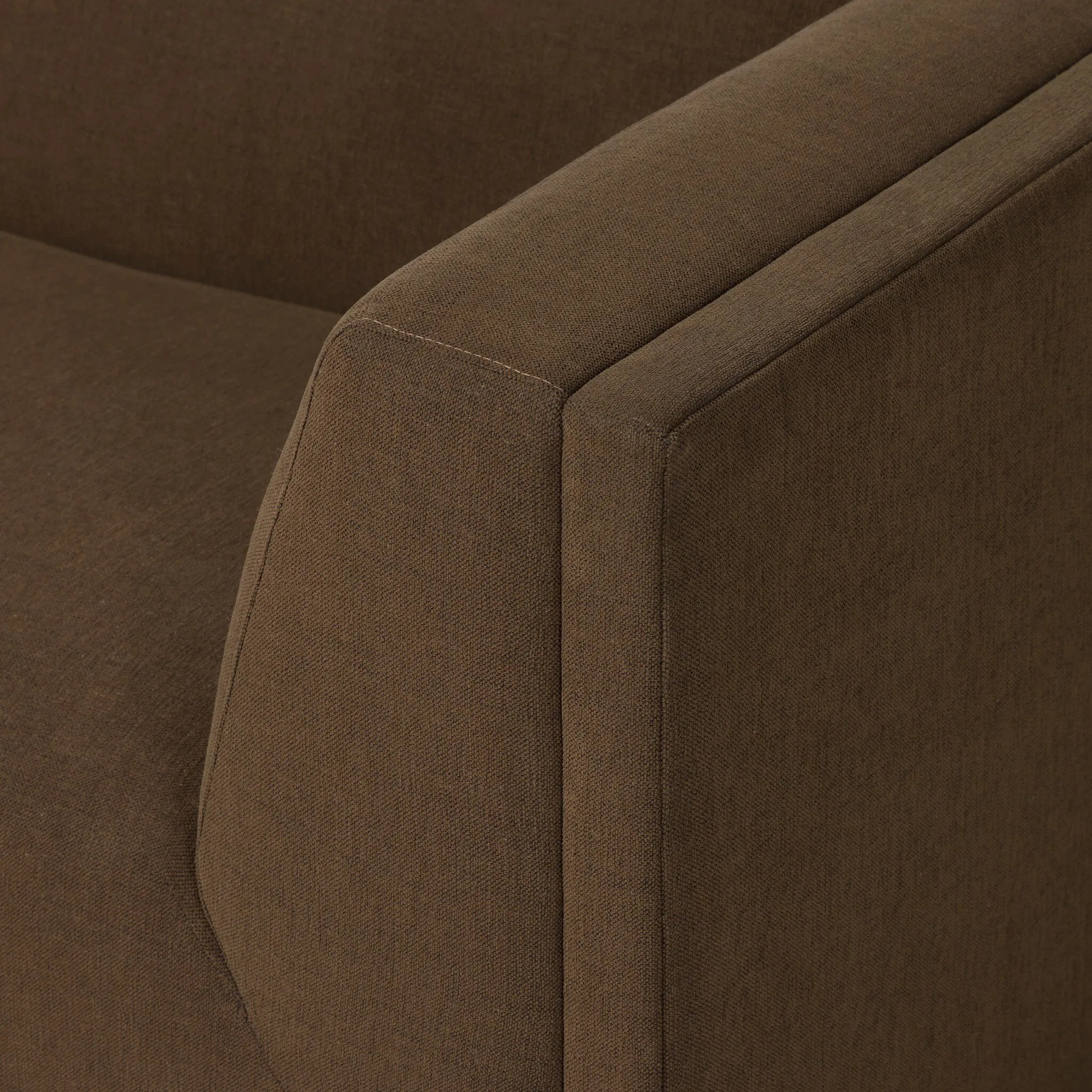 An inviting take on the classic tuxedo sofa, made for modern living. Celebrating mitered corners, for precision at every angle, and a layered, upholstered frame for a sharp, architectural look, the sofa rests on a wood plinth base. Tailored in the United States with thick pocket-seam cushions for unexpected comfort. Amethyst Home provides interior design, new home construction design consulting, vintage area rugs, and lighting in the Salt Lake City metro area.