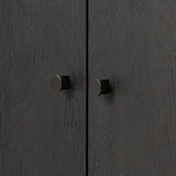 Lacquered cabinets make for evocative storage with their everlasting glossy finish. Great for small spaces, this sideboard with interior shelves features worn black oak doors for balance and contrast Amethyst Home provides interior design, new home construction design consulting, vintage area rugs, and lighting in the Miami metro area.