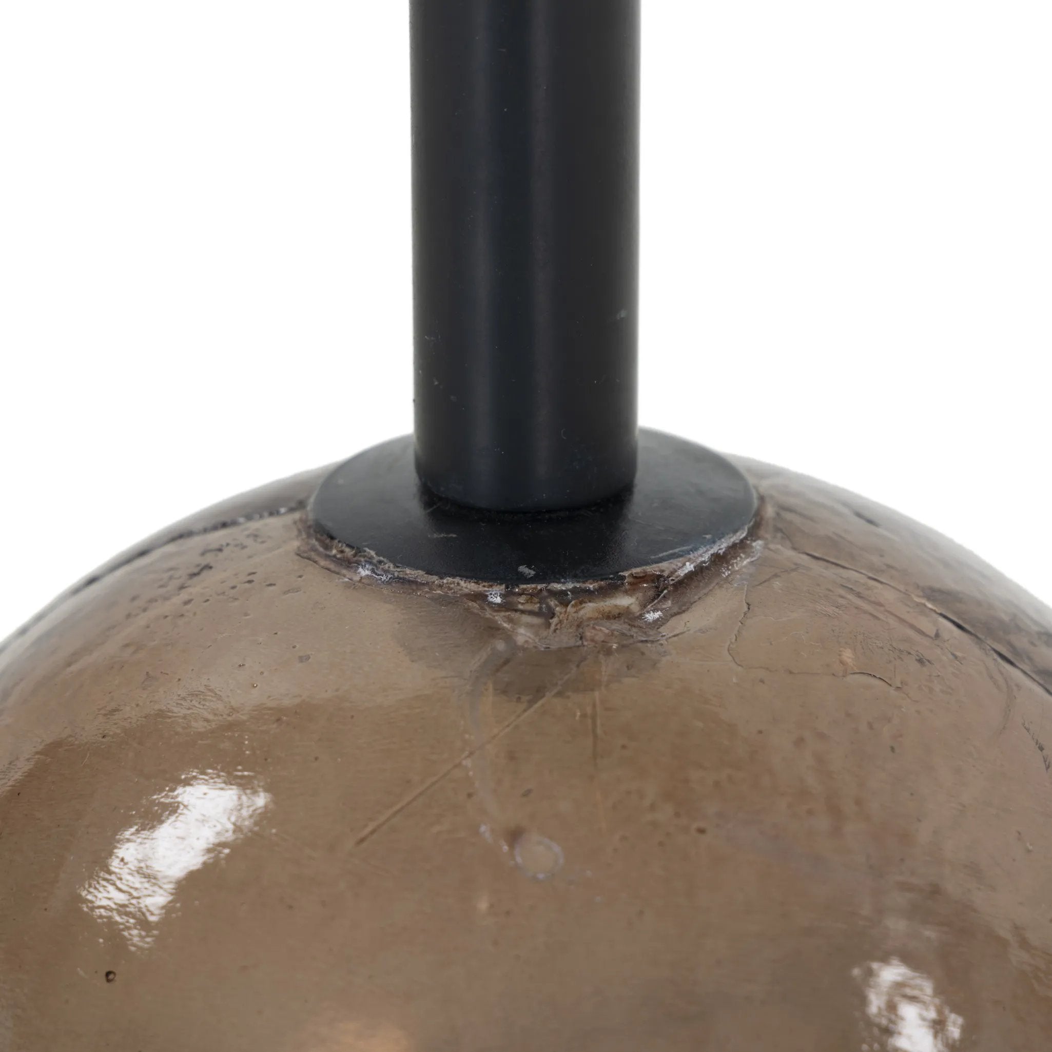 A sphere-shaped base of amber cast glass supports slim, black-finished iron piping and a tray-style tabletop that's perfectly sized to keep your favorite book or nightcap within reach Amethyst Home provides interior design, new home construction design consulting, vintage area rugs, and lighting in the Nashville metro area.