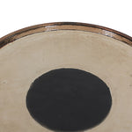 A sphere-shaped base of amber cast glass supports slim, black-finished iron piping and a tray-style tabletop that's perfectly sized to keep your favorite book or nightcap within reach Amethyst Home provides interior design, new home construction design consulting, vintage area rugs, and lighting in the Winter Garden metro area.