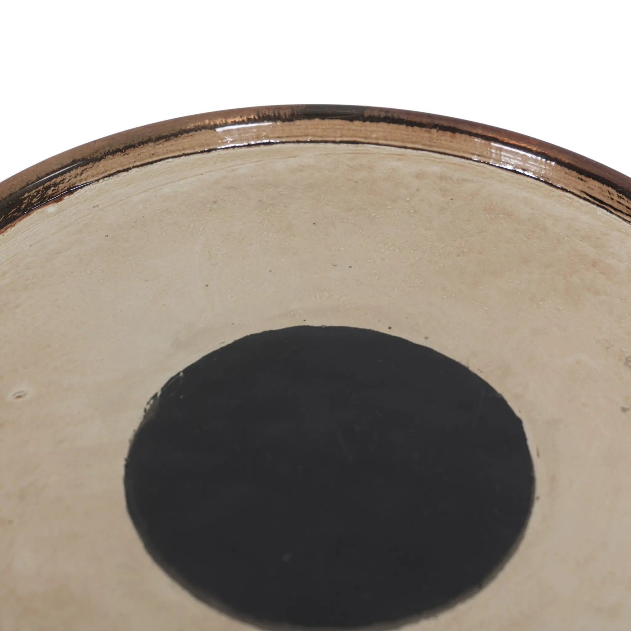 A sphere-shaped base of amber cast glass supports slim, black-finished iron piping and a tray-style tabletop that's perfectly sized to keep your favorite book or nightcap within reach Amethyst Home provides interior design, new home construction design consulting, vintage area rugs, and lighting in the Winter Garden metro area.