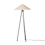 An exaggeratedly slim, airy tripod base of black-finished iron supports a light beige shade of 100% cotton, for a classic look with contrast Amethyst Home provides interior design, new home construction design consulting, vintage area rugs, and lighting in the Boston metro area.
