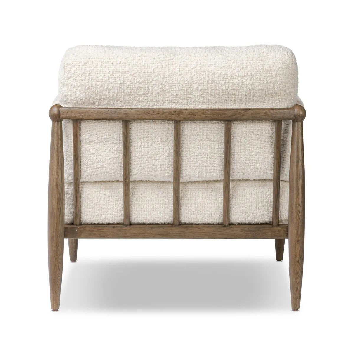 Featuring Warren Ivan Snow Chair by Four Hands at Amethyst Home. A classic silhouette through a contemporary lens. Framed in vintage oak, this accent chair features tapered legs, spindles along the arms and bauble details. Finished in Turkish-made upholstery with a heavy pile that blends brushed, pulled and boucle styles, it's woven into a subtle linear pat. Amethyst Home provides interior design, new home construction design consulting, vintage area rugs, and lighting in the Park City metro area.