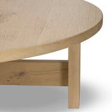 Simple in shape, high in quality. Made from bleached character oak that's been sustainably sourced from Romania, this rounded coffee table features paddle legs with stretcher details.As fans of luxe aesthetics at Amethyst, we love the nature inspired Willa Coffee Table. Amethyst Home provides interior design, new home construction design consulting, vintage area rugs, and lighting in the Austin metro area.