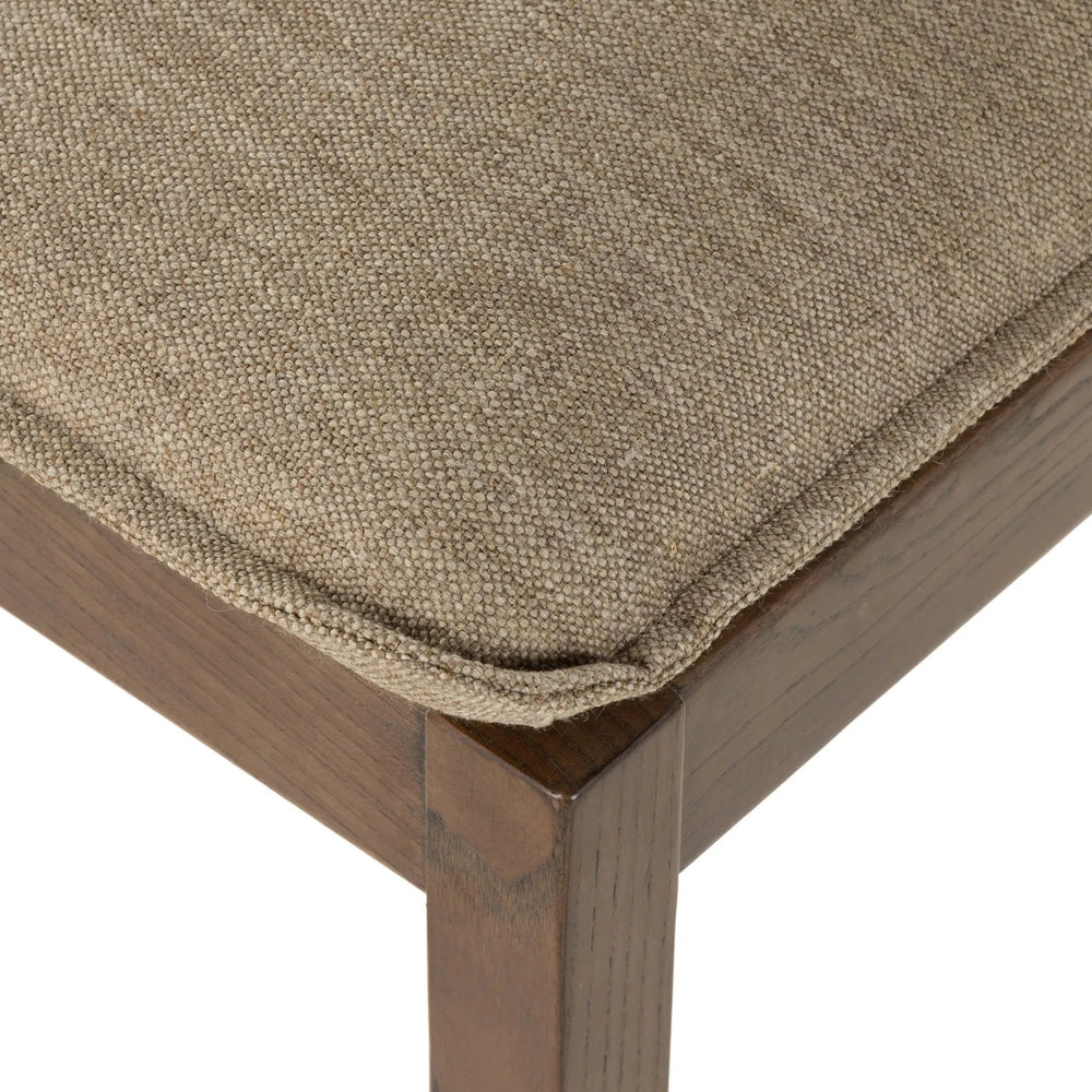 Featuring Wilmington Alcala Fawn Dining Chair by Four Hands at Amethyst Home. An Amethyst fave -- the Wilmington dining chair has a gorgeous coffee colored textile paired with medium toned wood and interesting leather buckles on the back -- we tied in the gold buckles with the gold chandelier above!  Inspired by the folded pillow form, the seat and back cushi. Amethyst Home provides interior design, new home construction design consulting, vintage area rugs, and lighting in the Seattle metro area.