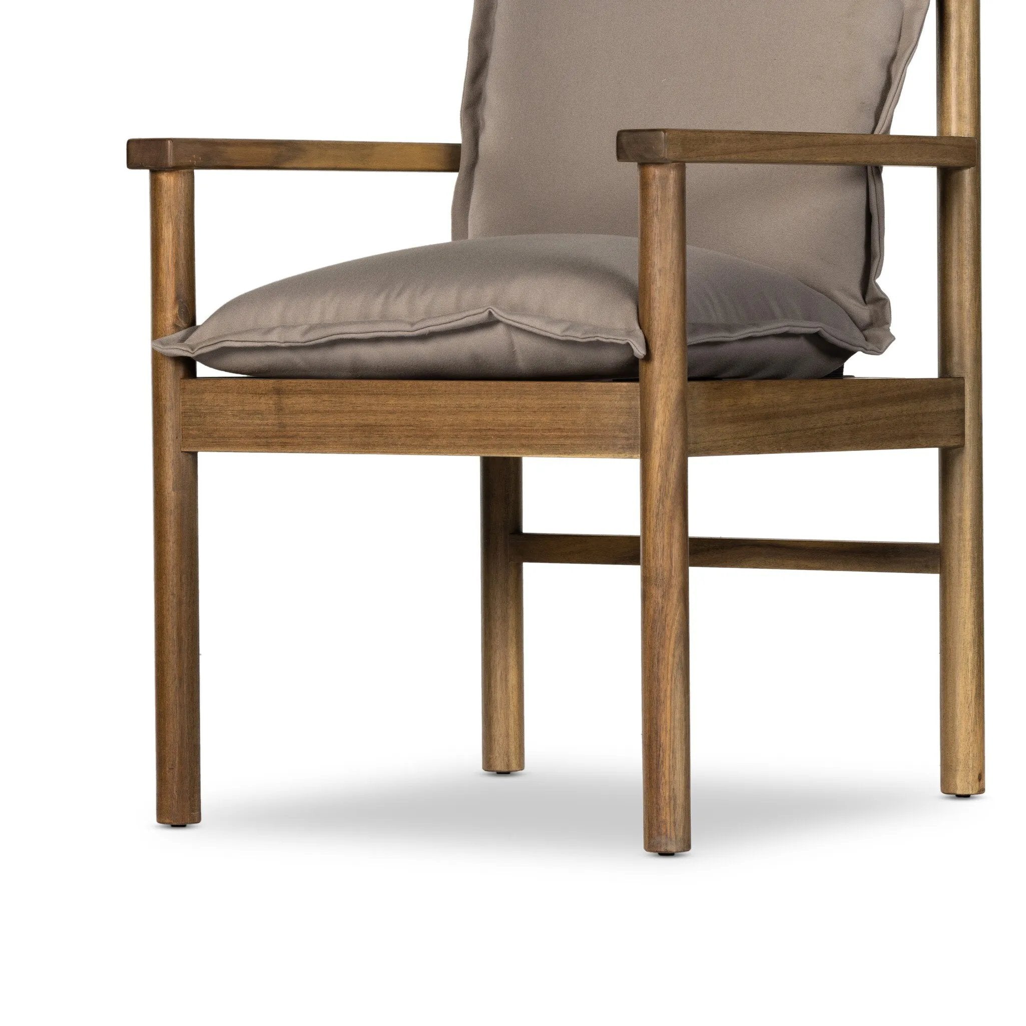 Mixed materials form this monochromatic, transitional silhouette. FSCÂ®-certified acacia and flange-detailed cushioning are accented by straps across the back for visual interest. Paddle arms contrast with a dowel leg. Cover or store indoors during inclement weather and when not in use.Collection: Oakdal Amethyst Home provides interior design, new home construction design consulting, vintage area rugs, and lighting in the Austin metro area.