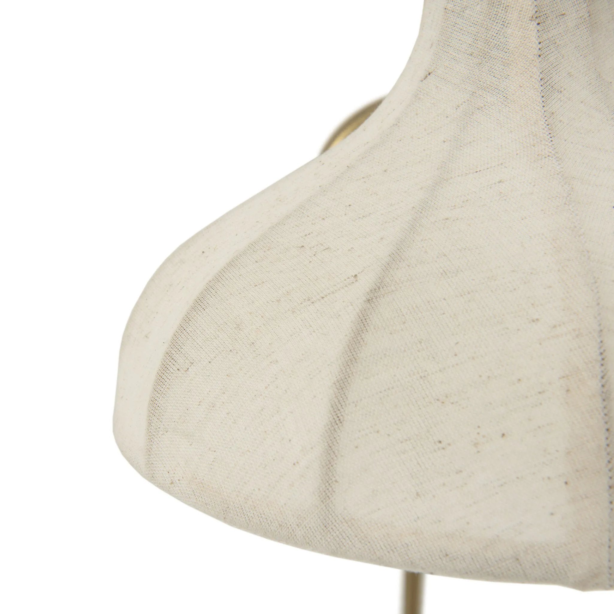 Slim and curved, a swan-neck arm supports a bell-shaped linen shade with brass boning, updating a traditional lighting look. This plug-in sconce design brings warm illumination to any space while discreet cord management keeps the look polished. Ideal for crafting warm, inviting reading corners or bedside ambiance Amethyst Home provides interior design, new home construction design consulting, vintage area rugs, and lighting in the Charlotte metro area.