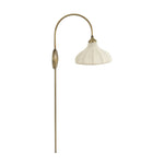 Slim and curved, a swan-neck arm supports a bell-shaped linen shade with brass boning, updating a traditional lighting look. This plug-in sconce design brings warm illumination to any space while discreet cord management keeps the look polished. Ideal for crafting warm, inviting reading corners or bedside ambiance Amethyst Home provides interior design, new home construction design consulting, vintage area rugs, and lighting in the Houston metro area.