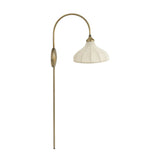 Slim and curved, a swan-neck arm supports a bell-shaped linen shade with brass boning, updating a traditional lighting look. This plug-in sconce design brings warm illumination to any space while discreet cord management keeps the look polished. Ideal for crafting warm, inviting reading corners or bedside ambiance Amethyst Home provides interior design, new home construction design consulting, vintage area rugs, and lighting in the Houston metro area.