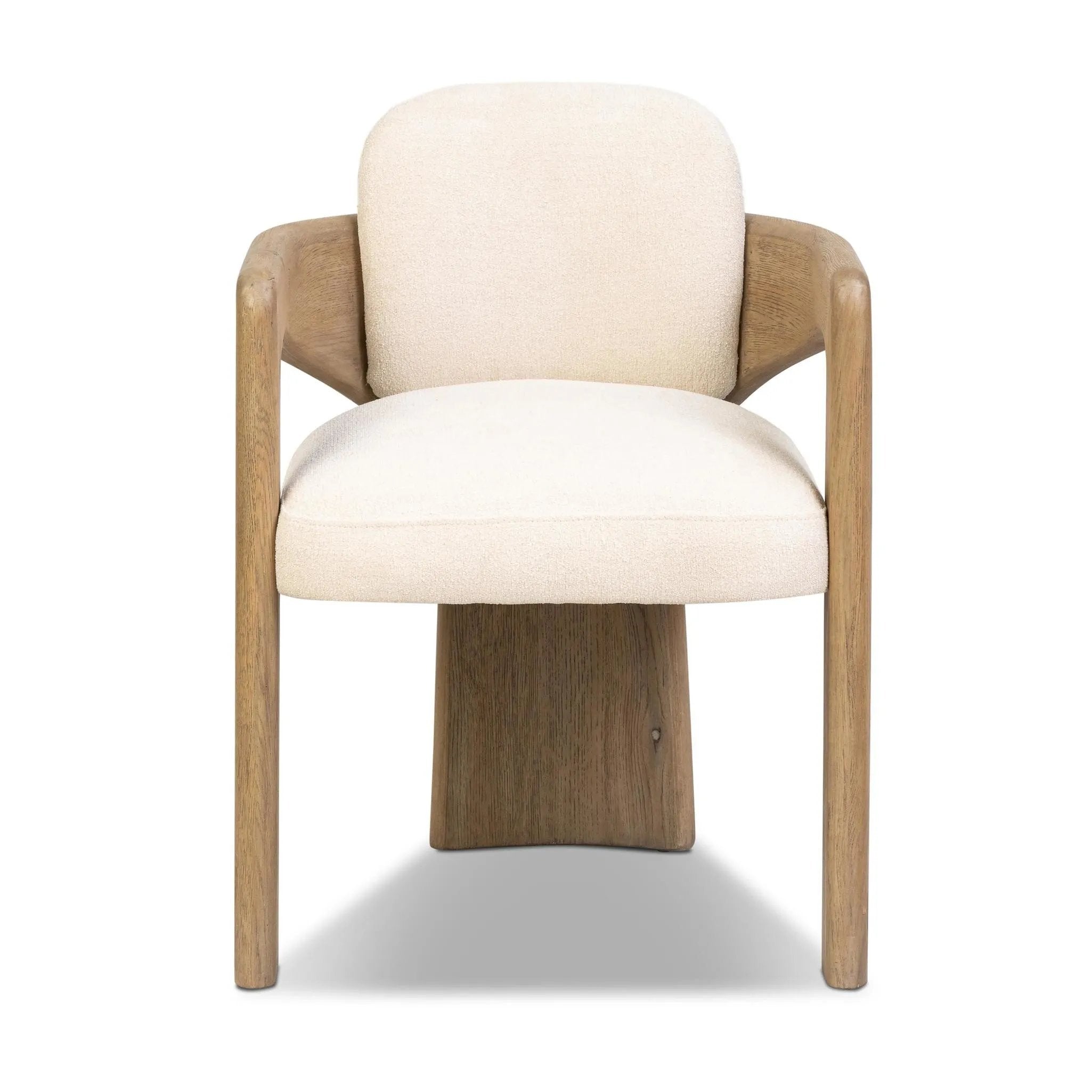 Striking from every view. This statement-making chair combines beautiful natural oak in tripod form with high-performance fabric. The cantilever design, with a wide plank back and sloping arms, form an eye-catching silhouette for the floating seat and overflowing back cushion. Amethyst Home provides interior design, new home construction design consulting, vintage area rugs, and lighting in the Alpharetta metro area.