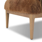 Bring the soul of a vintage find to your living room with this artfully updated accent chair. Solid ash legs and swooping iron arms give it a curated look, while a plush seat ensure comfort. Wrapped in cozy shearling to make any room feel instantly inviting. Amethyst Home provides interior design, new home construction design consulting, vintage area rugs, and lighting in the Dallas metro area.